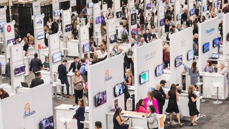 General view of people at trade show booths