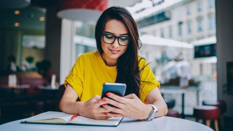 hotel guest communicating using smartphone