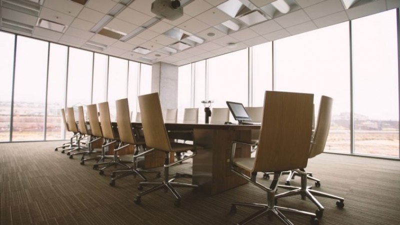 boardroom with chairs around table