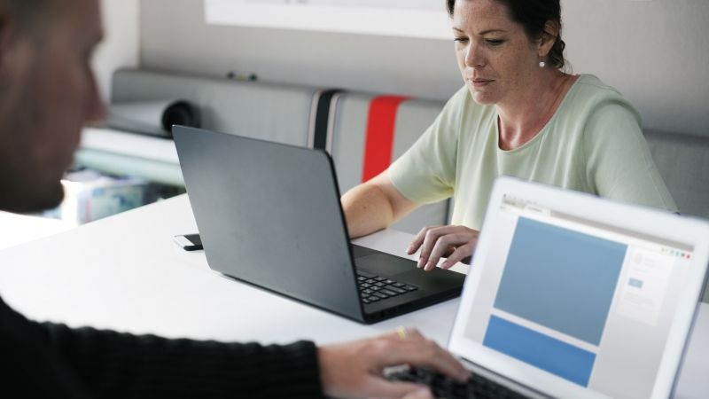 people conducting research on computers